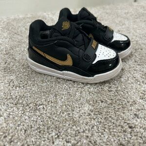 Nike Jordan toddler Black and Gold Sneakers 5c